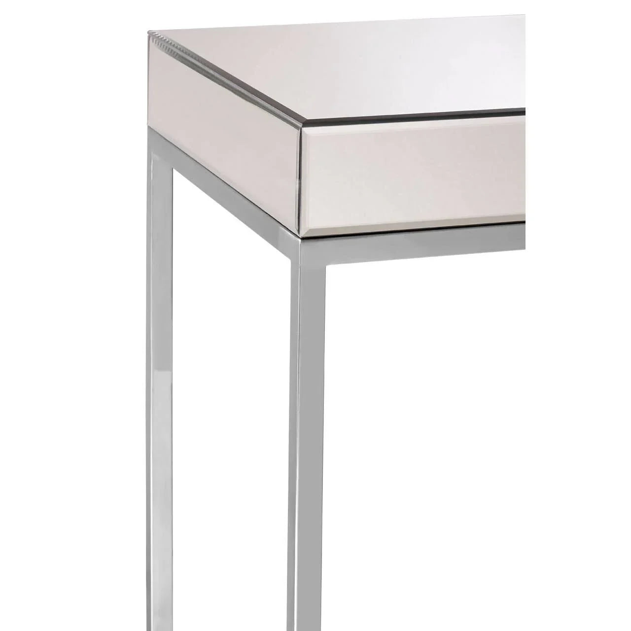 Mirrored console table with chrome metal legs and clean modern edge detail, close-up view