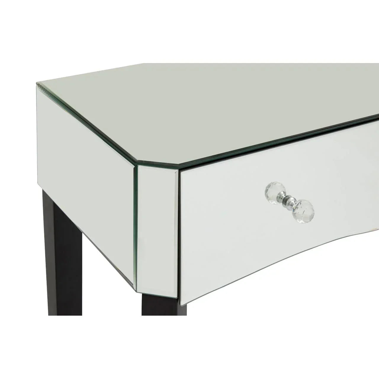 Mirrored corner dressing table with glass drawer knob and black legs, close-up view