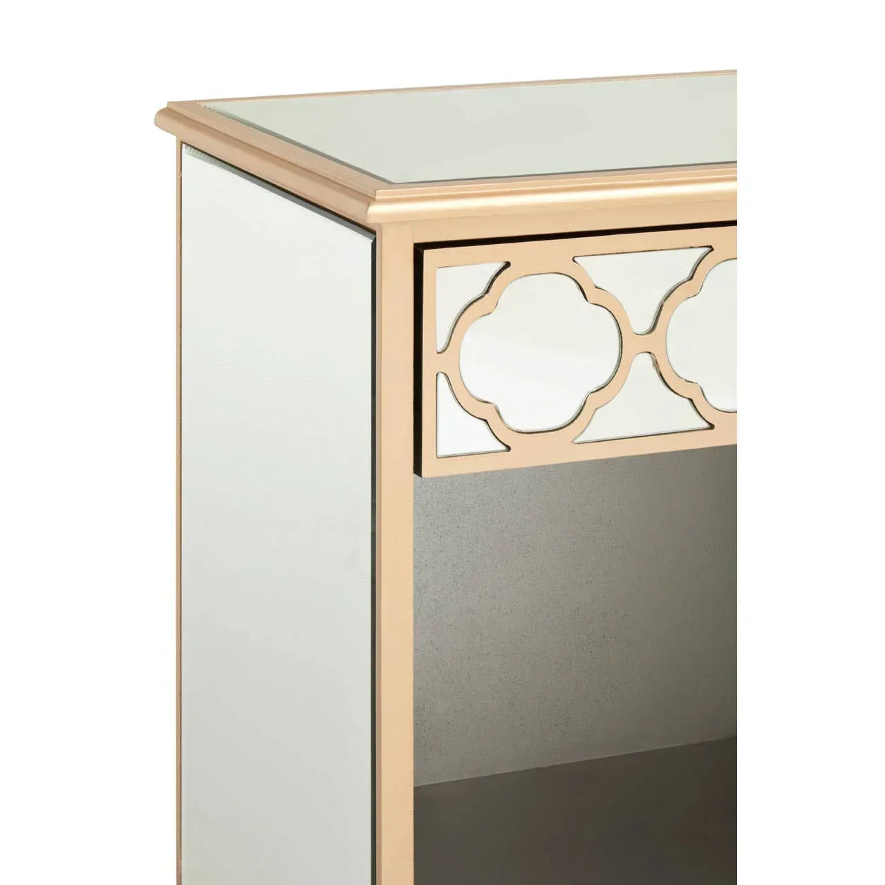 Mirrored console table corner with gold trim and geometric pattern detail