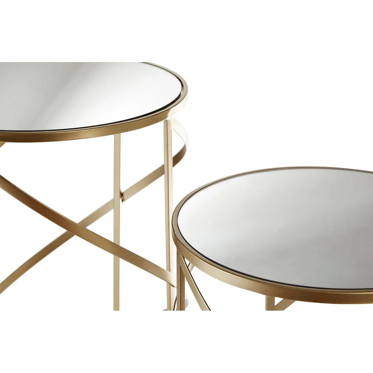 Round glass top nesting tables with gold metal frames, close up on surface detail