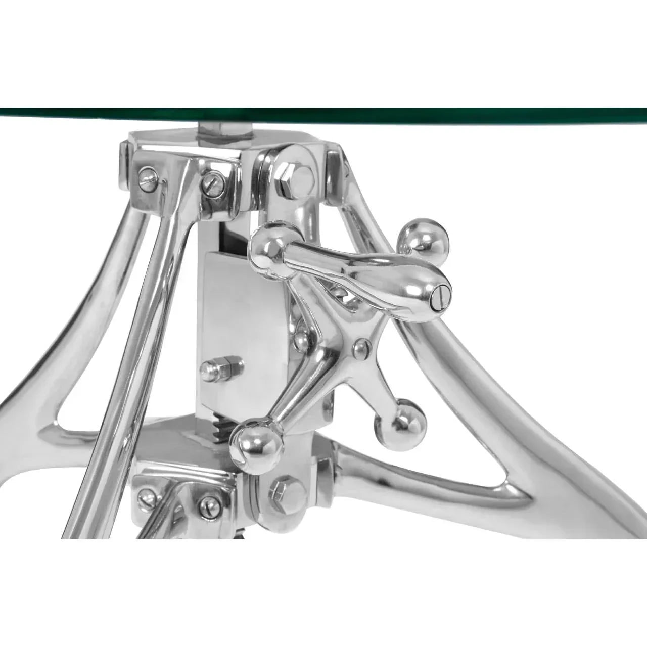 Close-up of chrome metal table base with glass tabletop and industrial-style handle