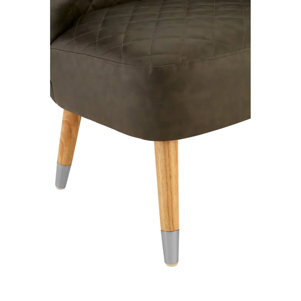 Brown upholstered chair seat with quilted stitching and light wood legs with metal tips