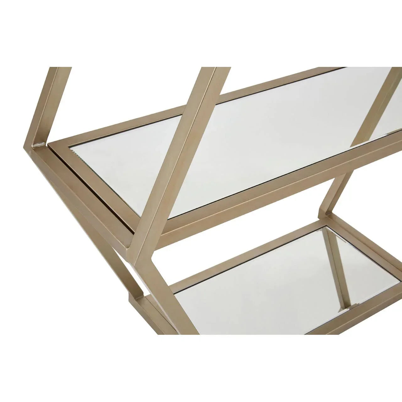 Gold metal framed shelving unit with mirrored glass shelves, close-up on corners