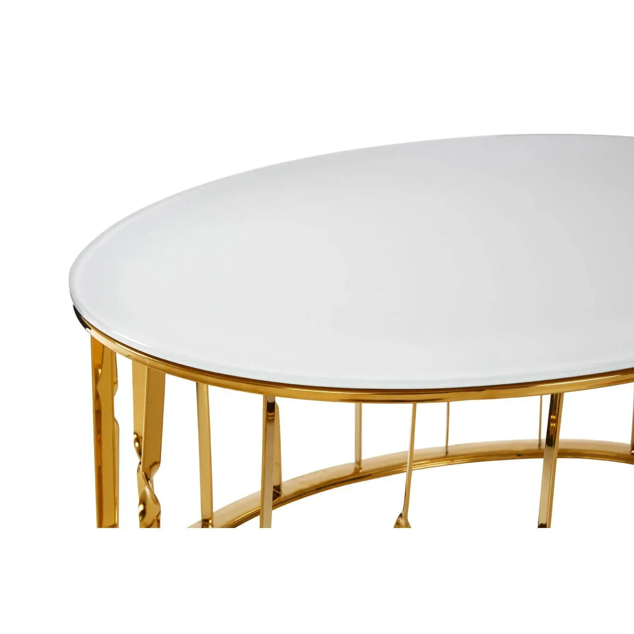 Round white glass coffee table with gold metal frame, close-up of tabletop and legs