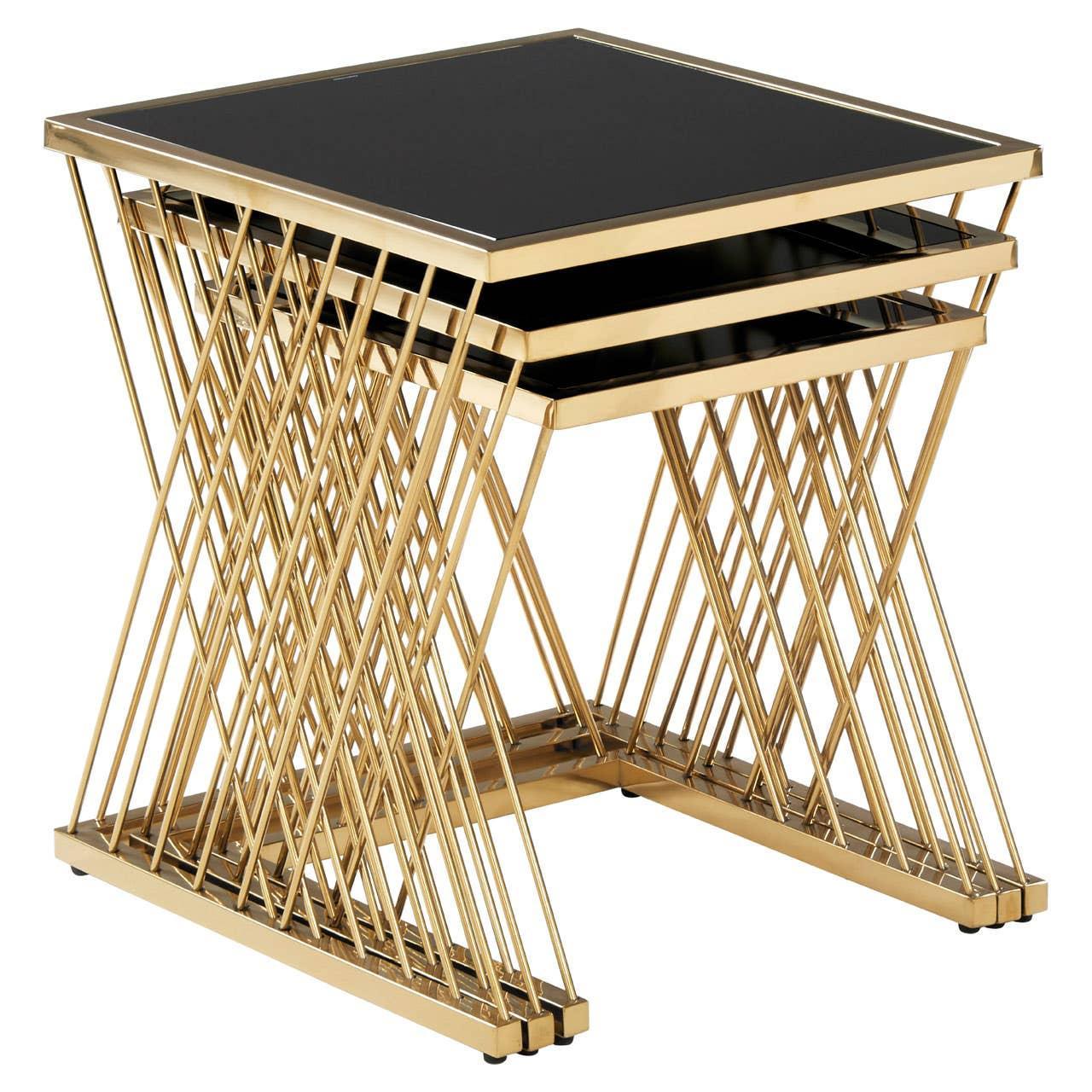 Gold metal and black glass nest of tables with geometric frame, side angle view
