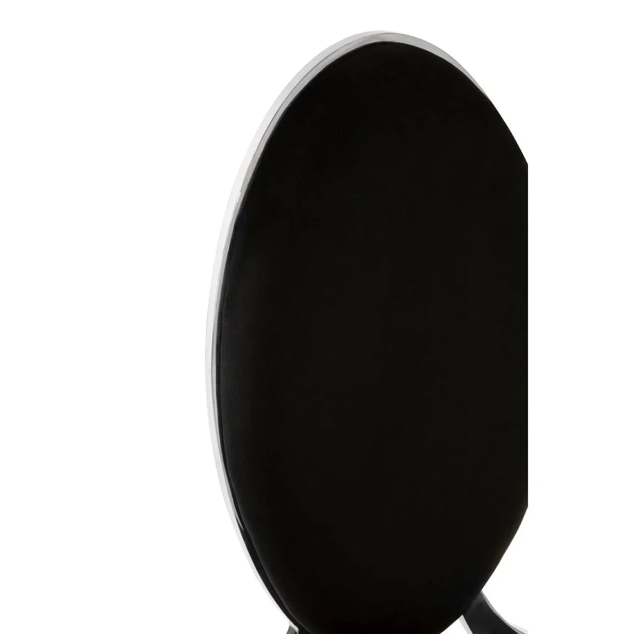 Closeup of oval black upholstered chair back with silver frame