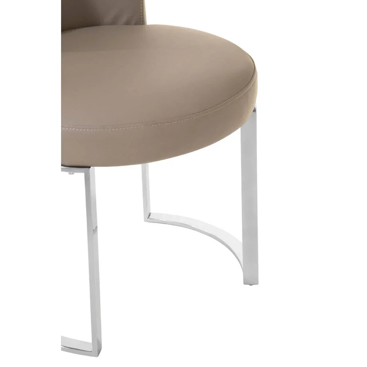 Beige dining chair with round upholstered seat and chrome metal legs, close-up view