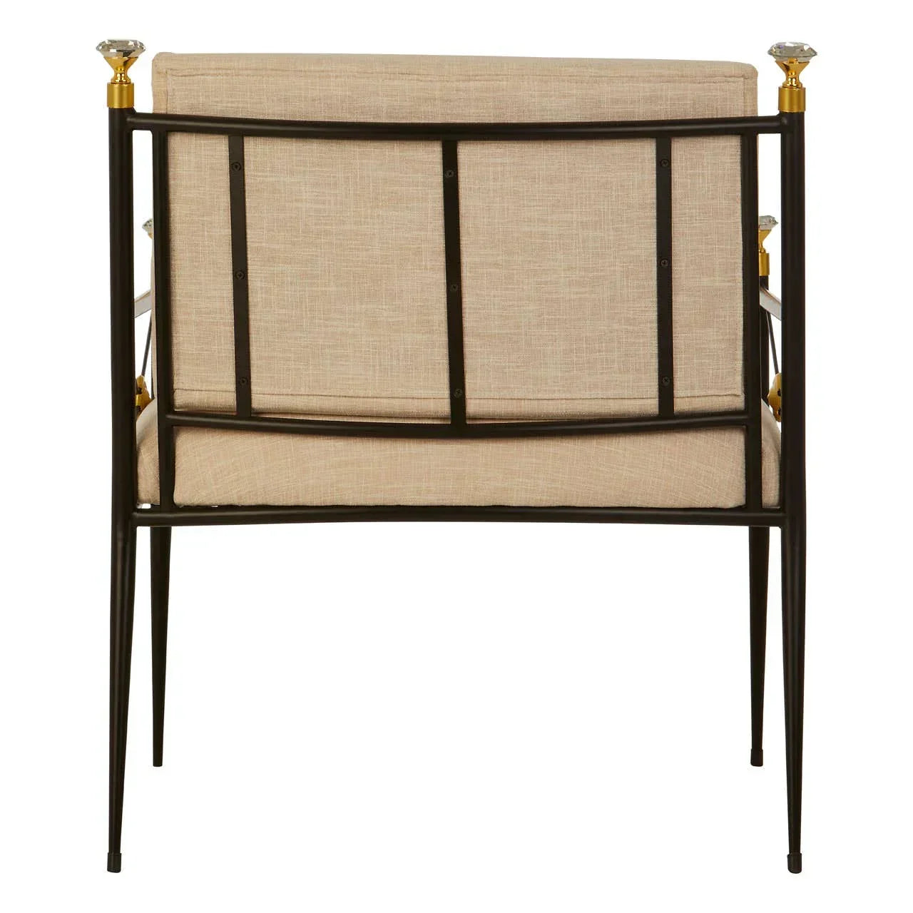Beige upholstered accent chair with black metal frame and crystal finials, rear view