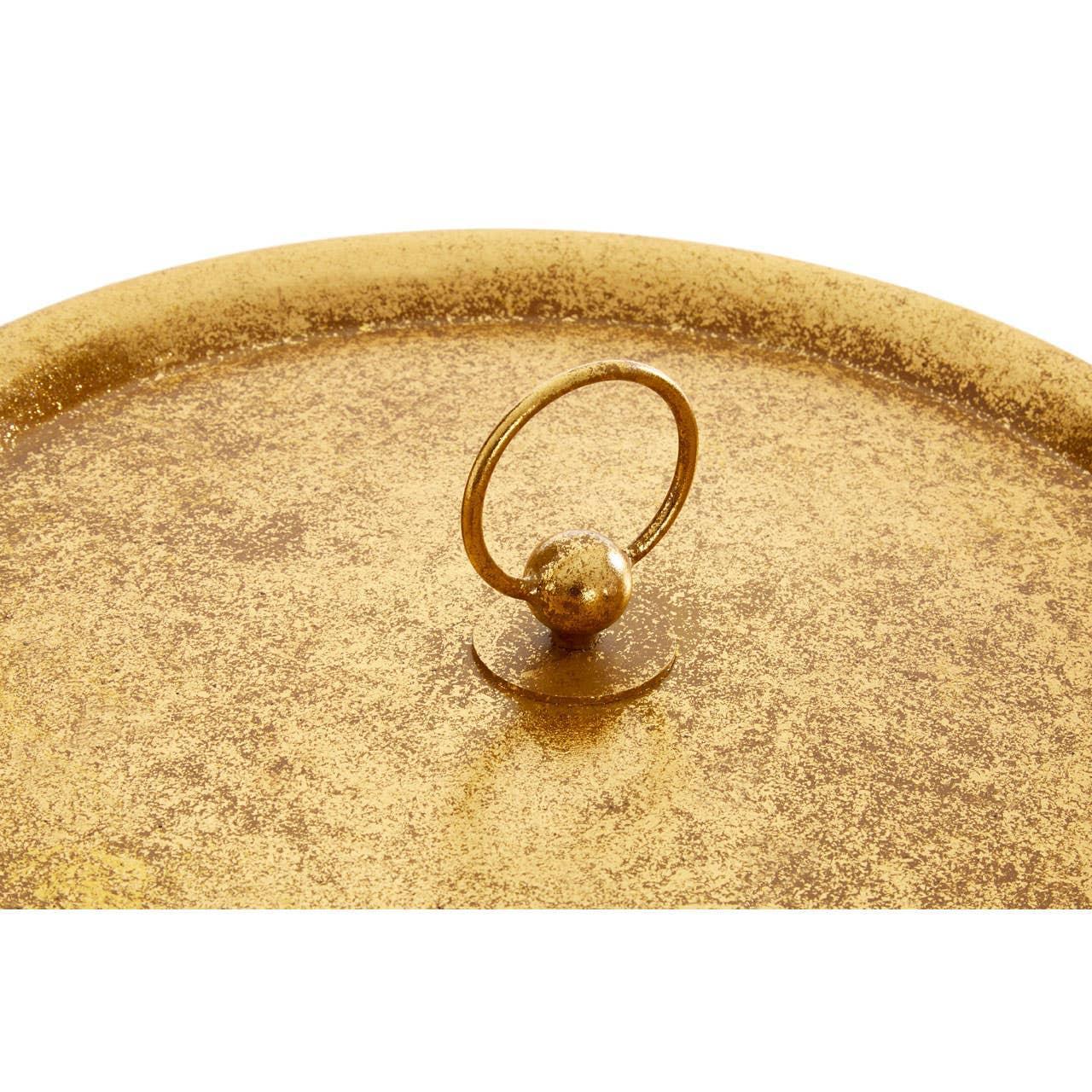 Gold metal tray with raised edge and circular handle detail at center