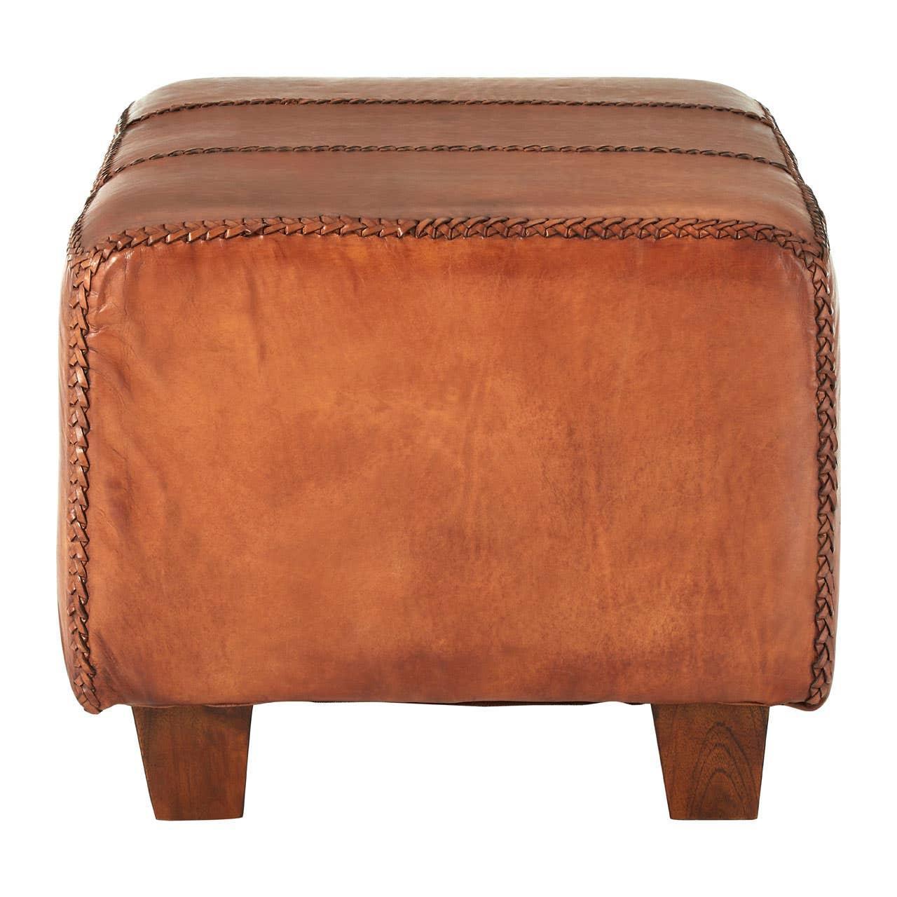 Brown leather ottoman with wooden legs and visible stitched edges, front view