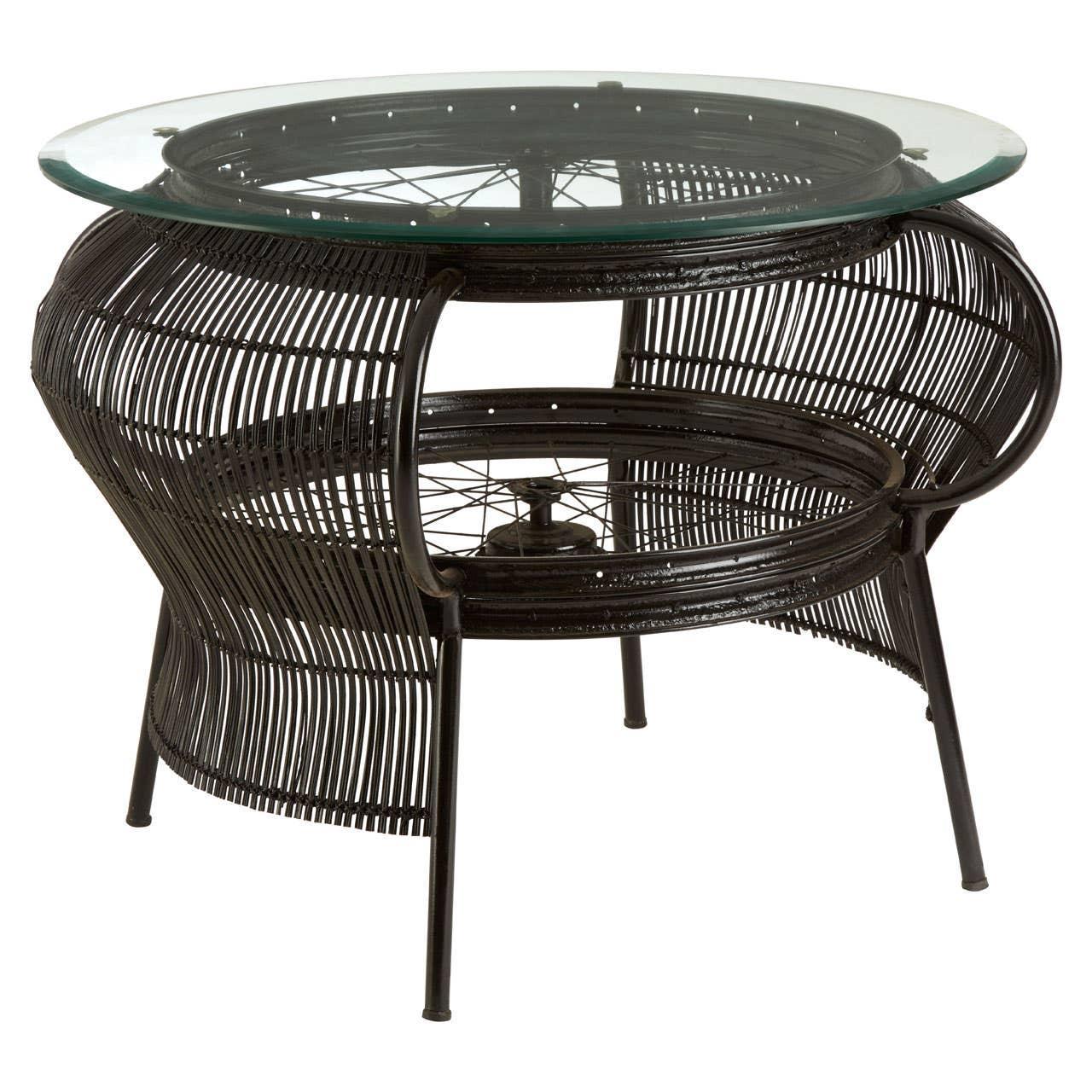 Black rattan coffee table with glass top and open curved base design