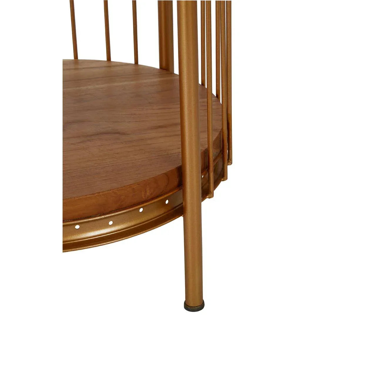 Close view of round wooden side table with gold metal frame and slender legs