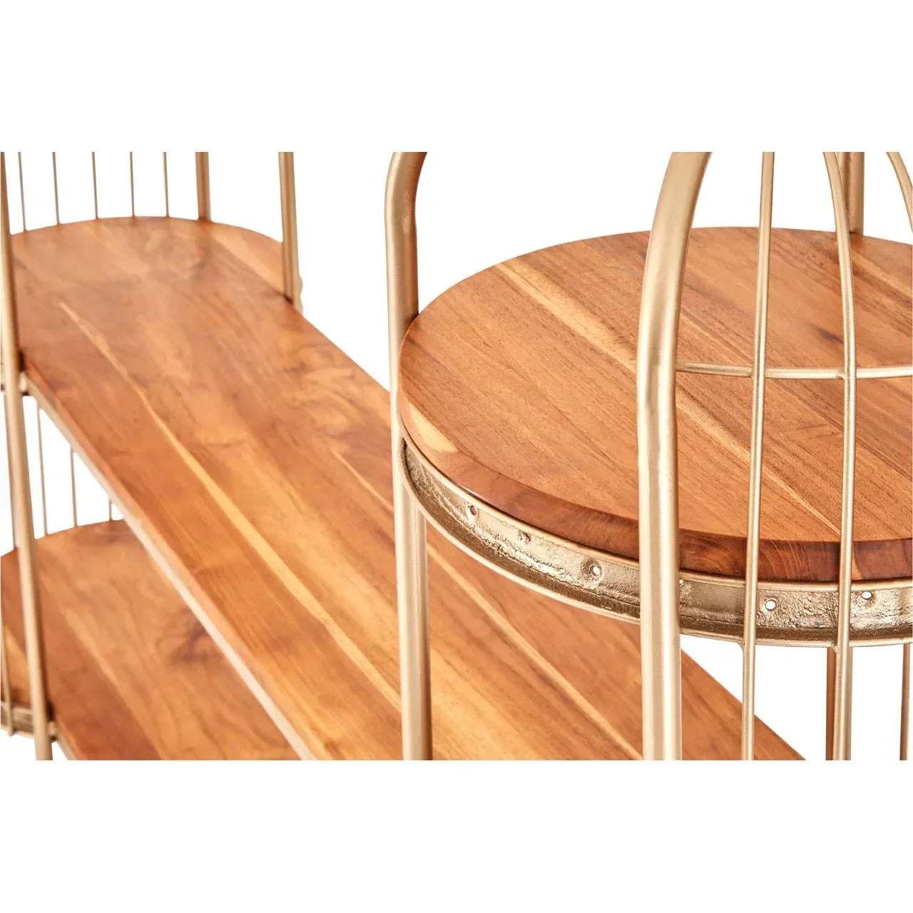 Close-up of wooden shelving unit with gold metal frame and round accent shelf