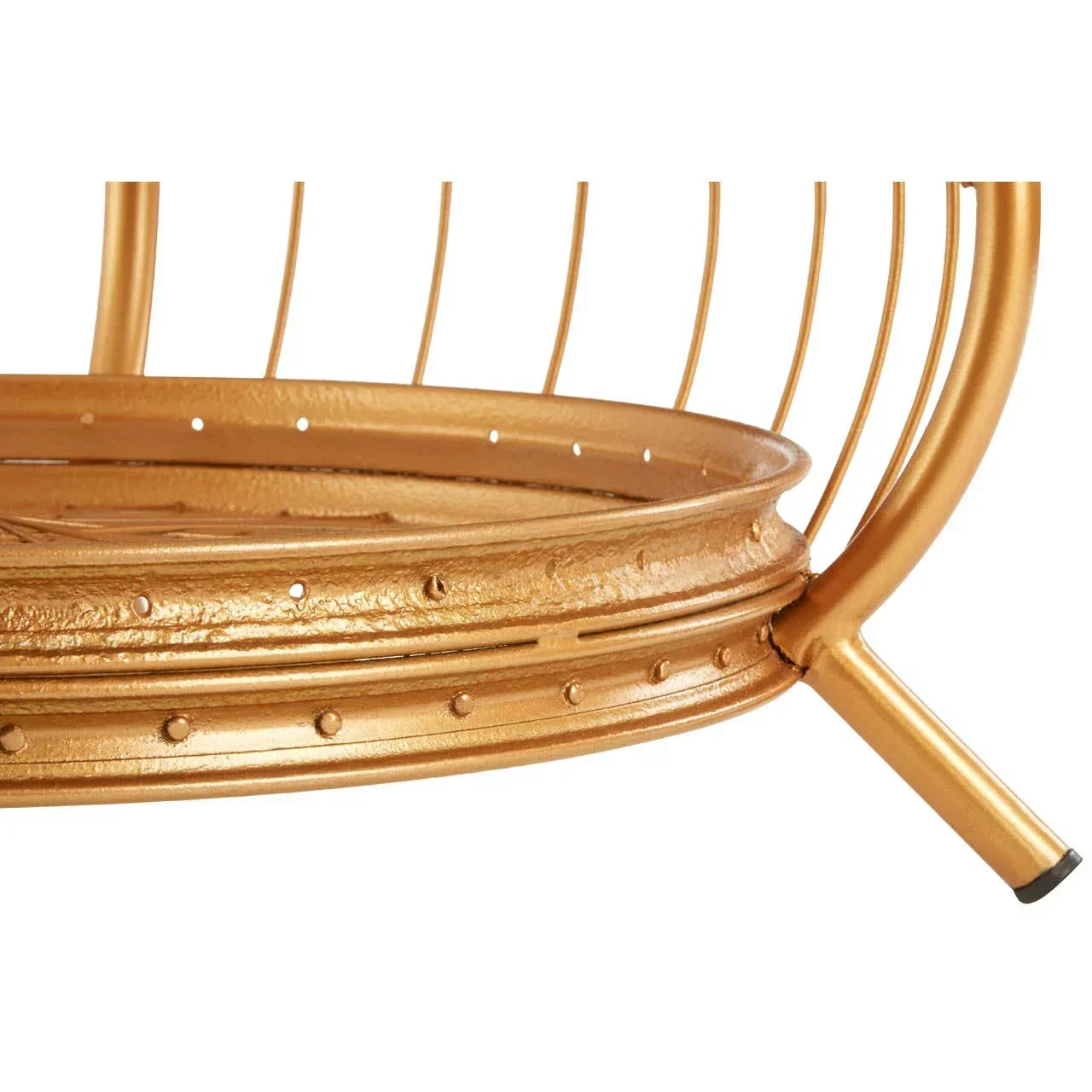 Close-up of gold metal side table frame with textured rim and angled leg