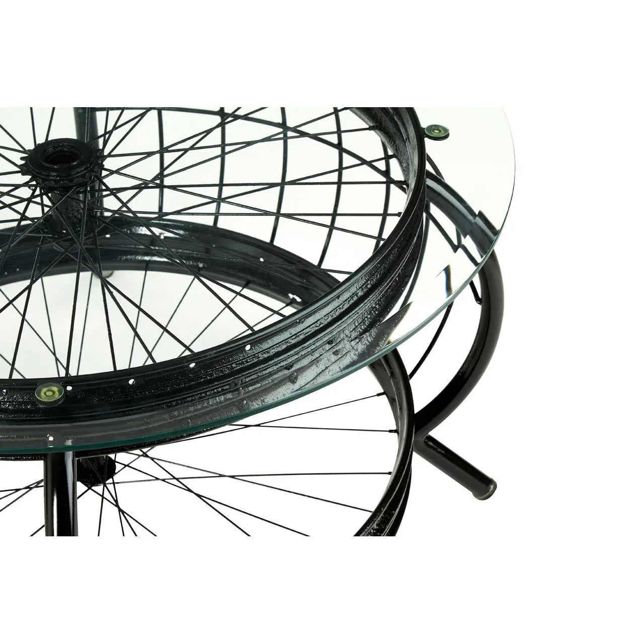 Round glass coffee table with black metal frame and bicycle wheel spoke detail