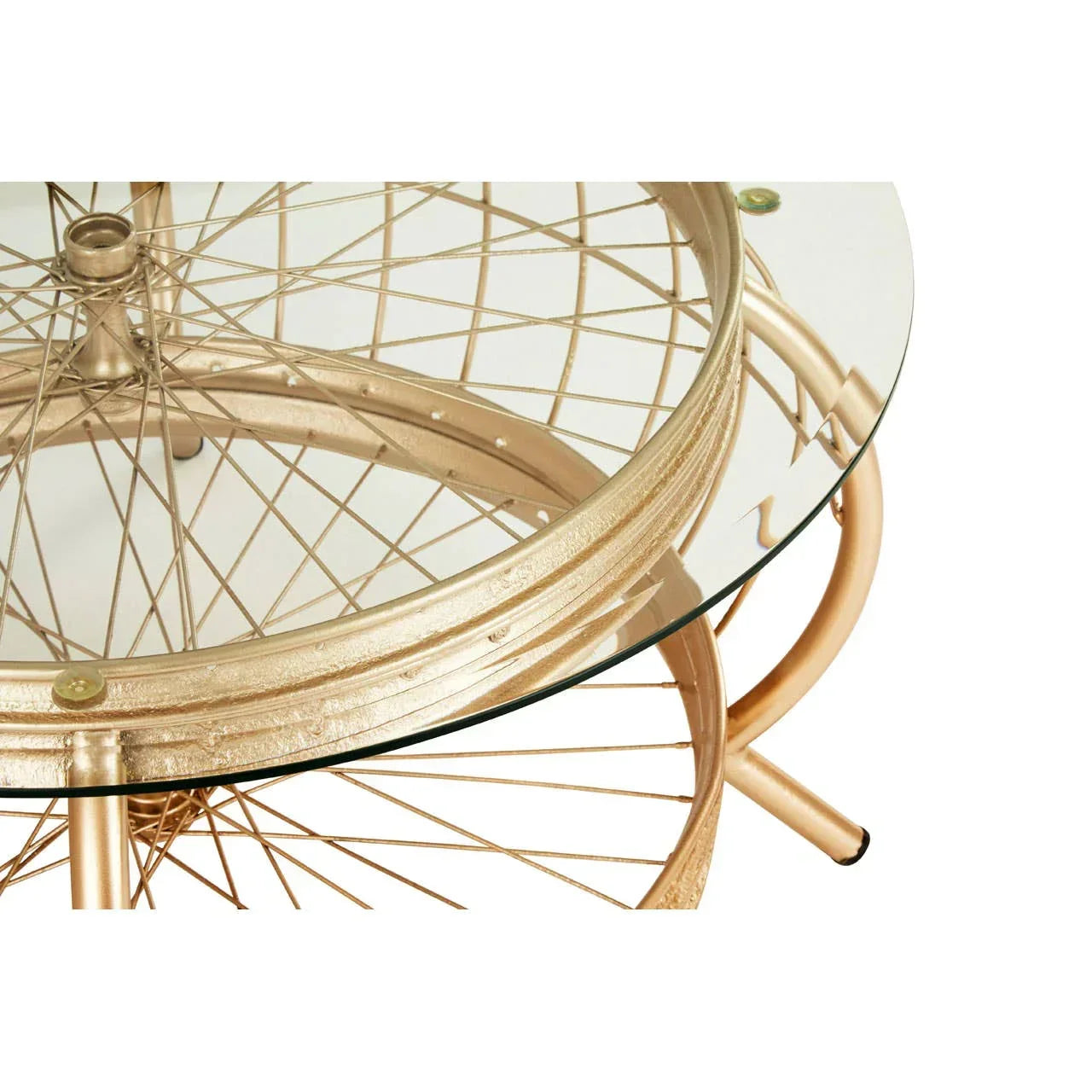 Round glass coffee table with gold metal bicycle wheel base, modern industrial design