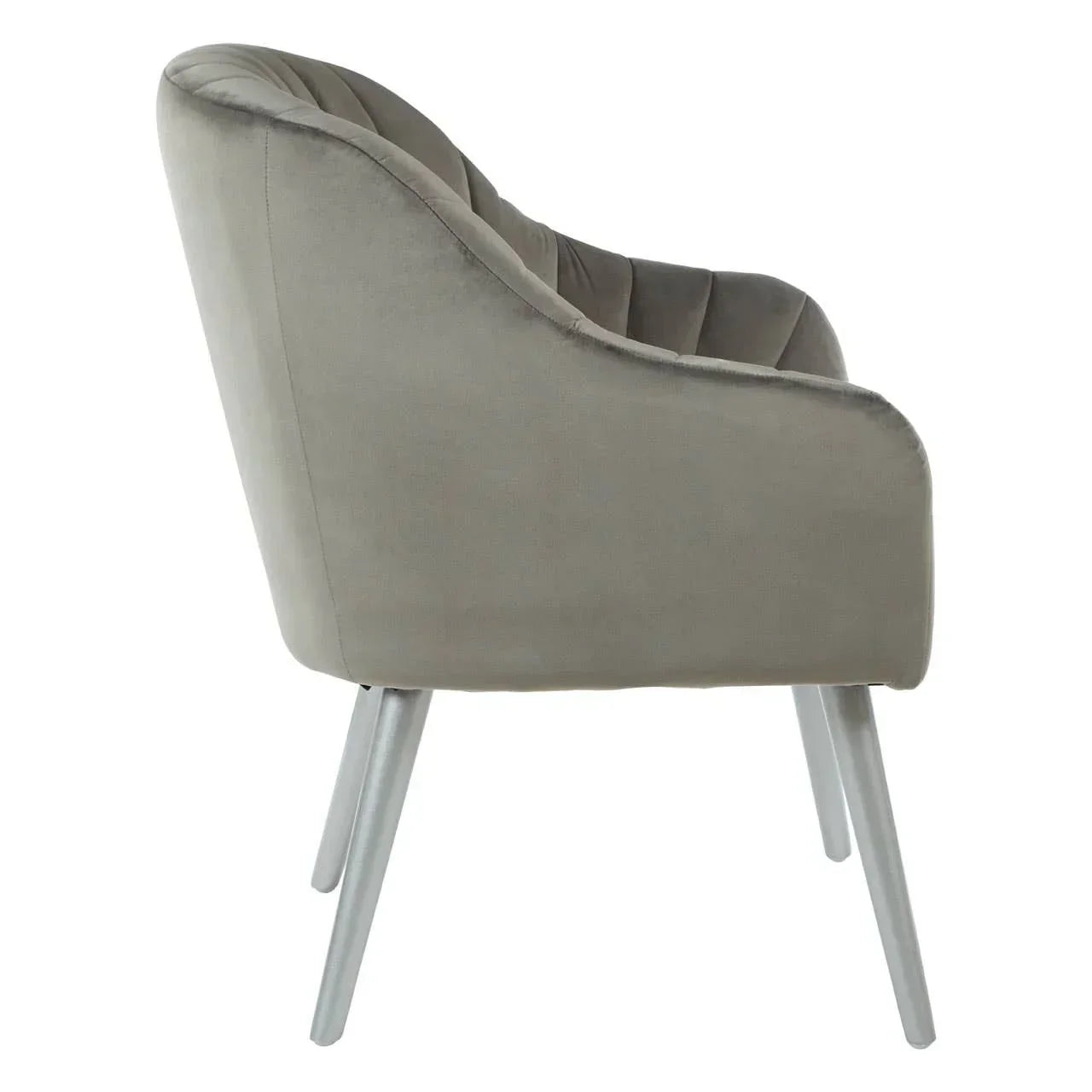 Side view of grey velvet accent chair with metal legs and curved backrest