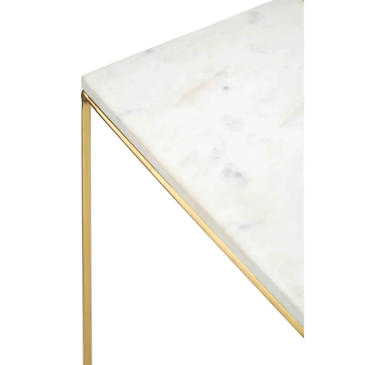 Corner detail of marble top table with gold metal frame