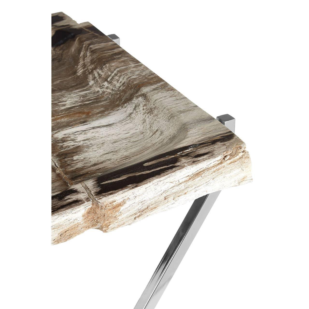 Live edge wood dining table with chrome metal legs, close-up of corner detail