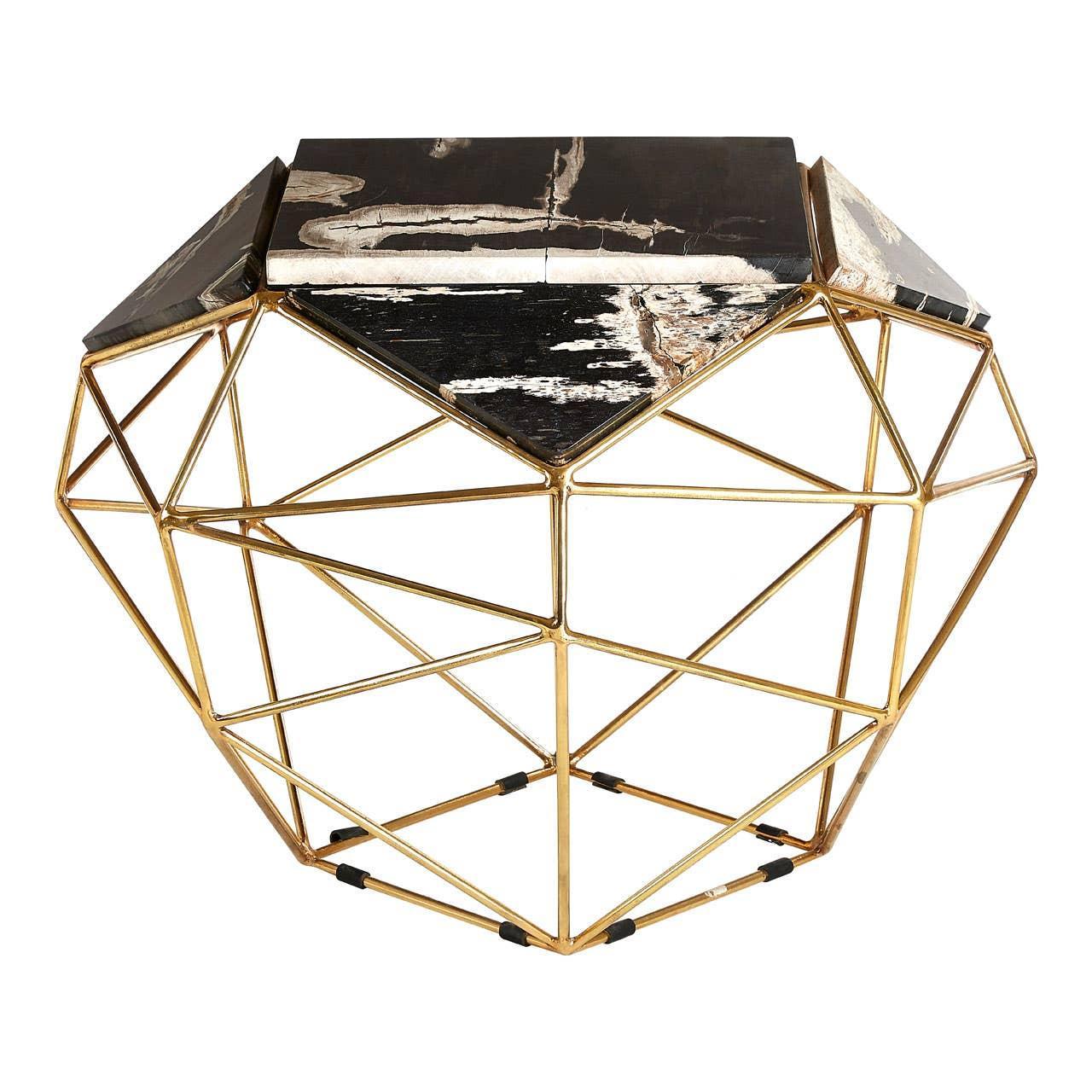 Geometric side table with gold metal frame and black marble top