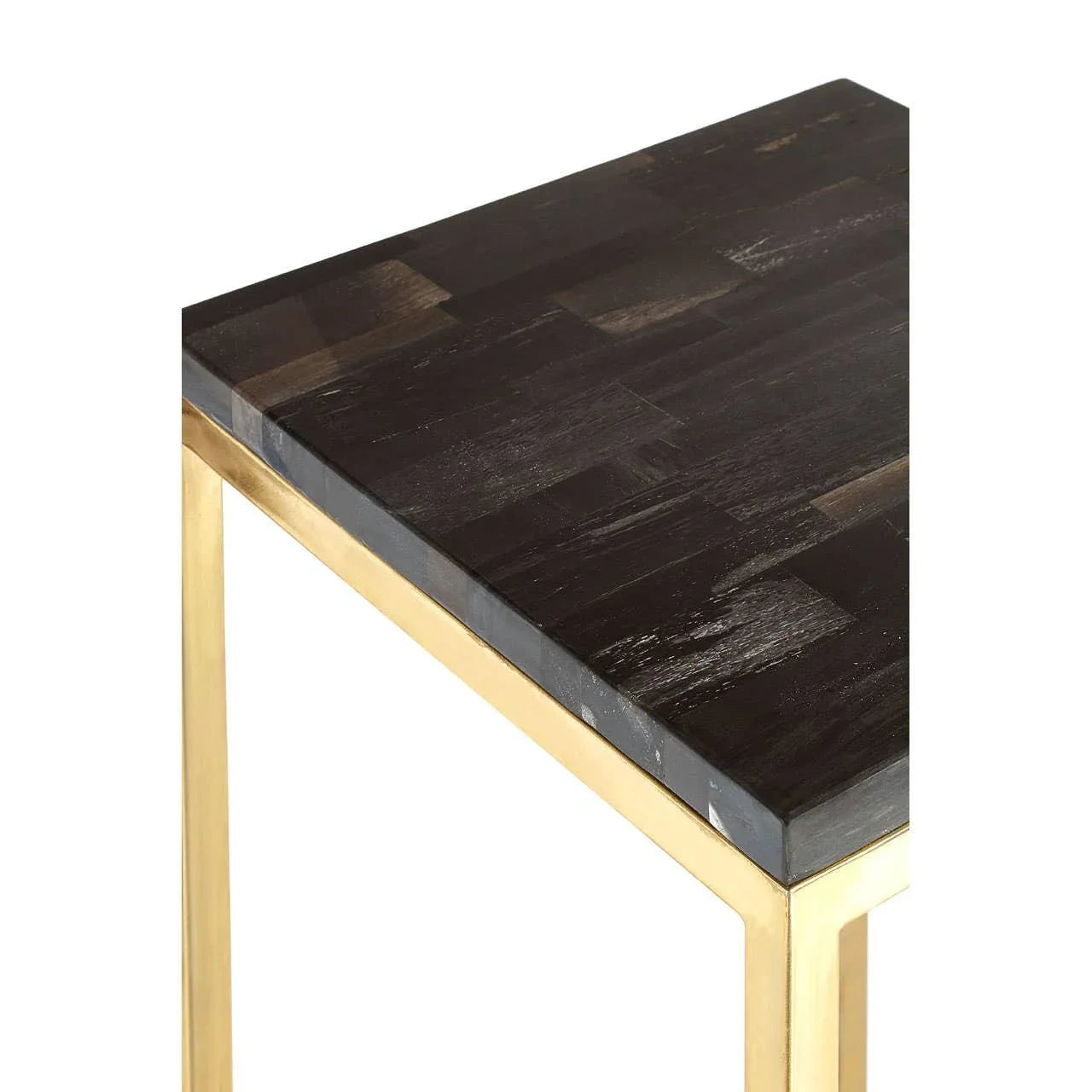 Modern side table with dark wood top and gold metal legs, close-up corner view
