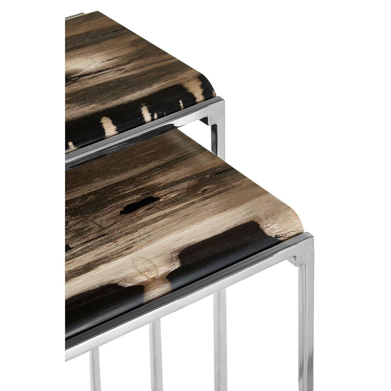 Set of two wooden nesting tables with natural grain and chrome metal frames