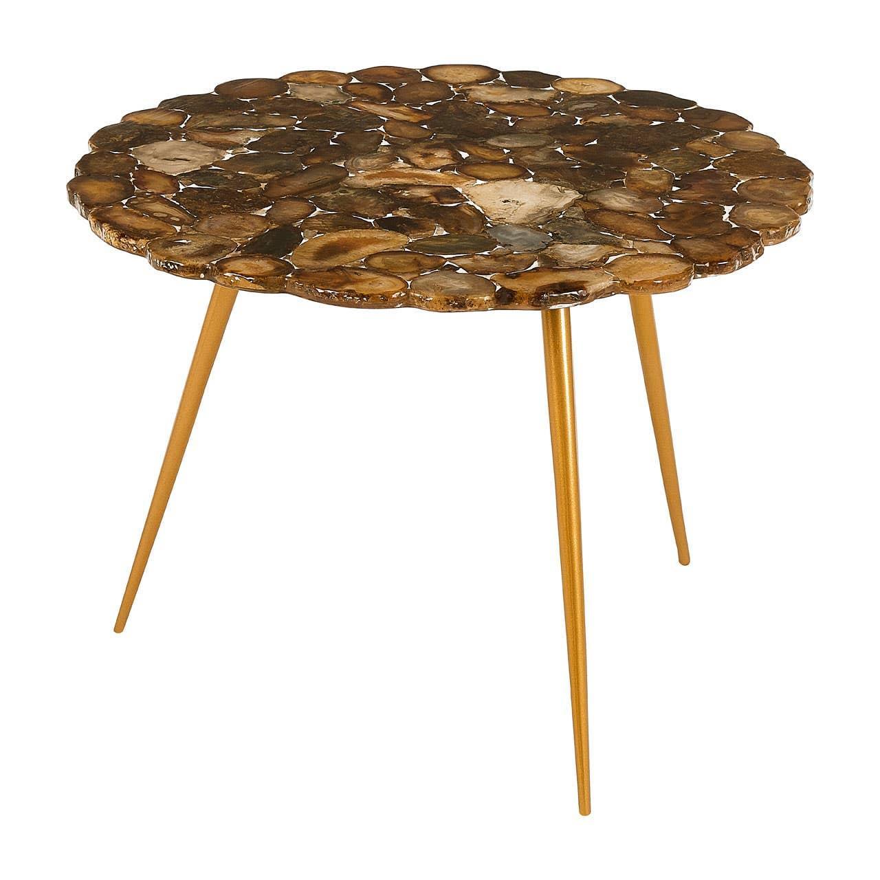 Round side table with polished petrified wood top and slim gold metal legs