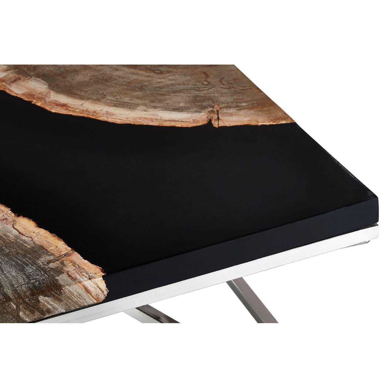 Close-up of live edge wood and black epoxy dining table with metal legs