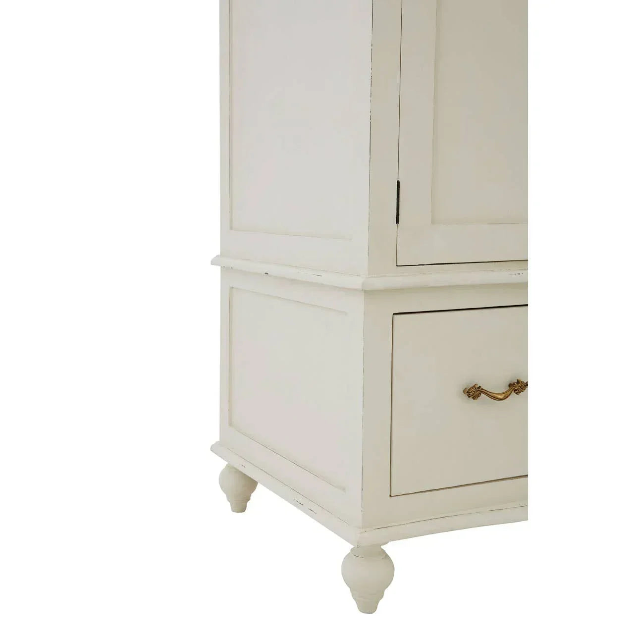 Close-up of cream wooden cabinet with gold handle and turned legs