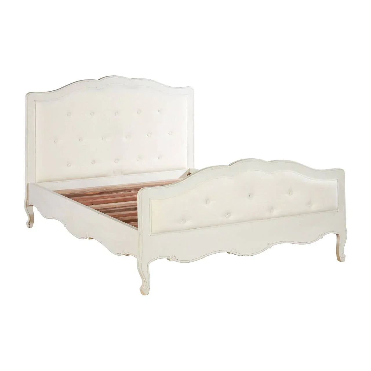 cream upholstered bed frame with tufted headboard and footboard, carved wooden legs
