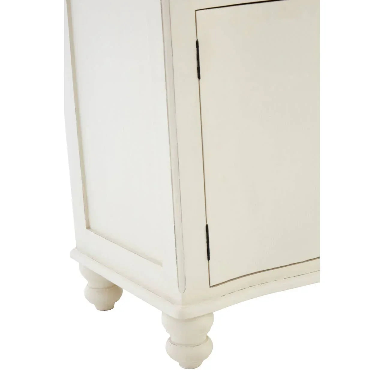Antique white wooden cabinet corner with panelled door and turned feet