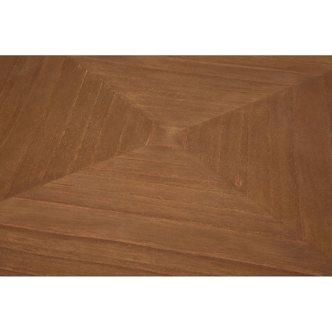 Close-up of wooden dining table top with geometric pattern and natural wood grain