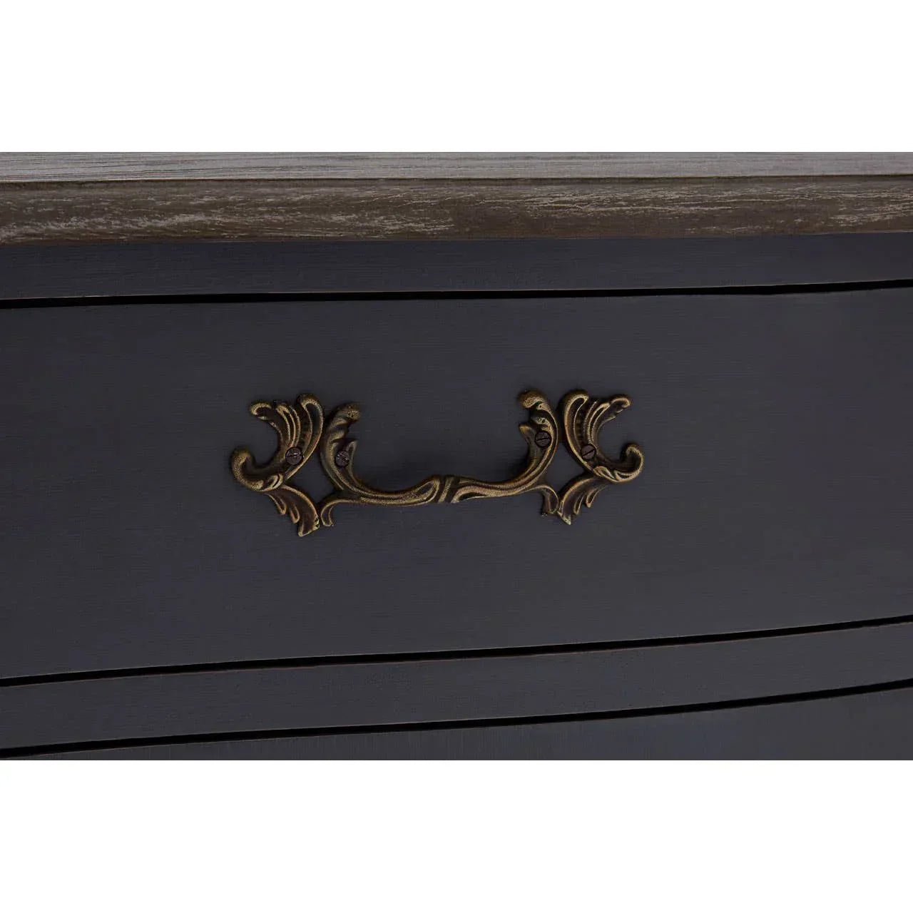 Dark wood chest of drawers with ornate brass handle detailing