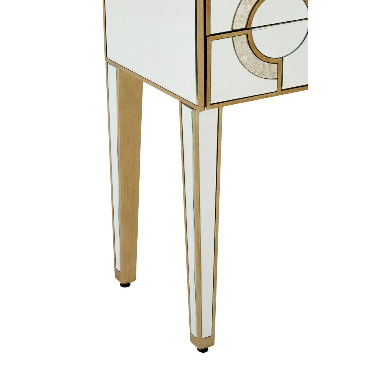 Mirrored furniture leg with gold trim and geometric drawer detail