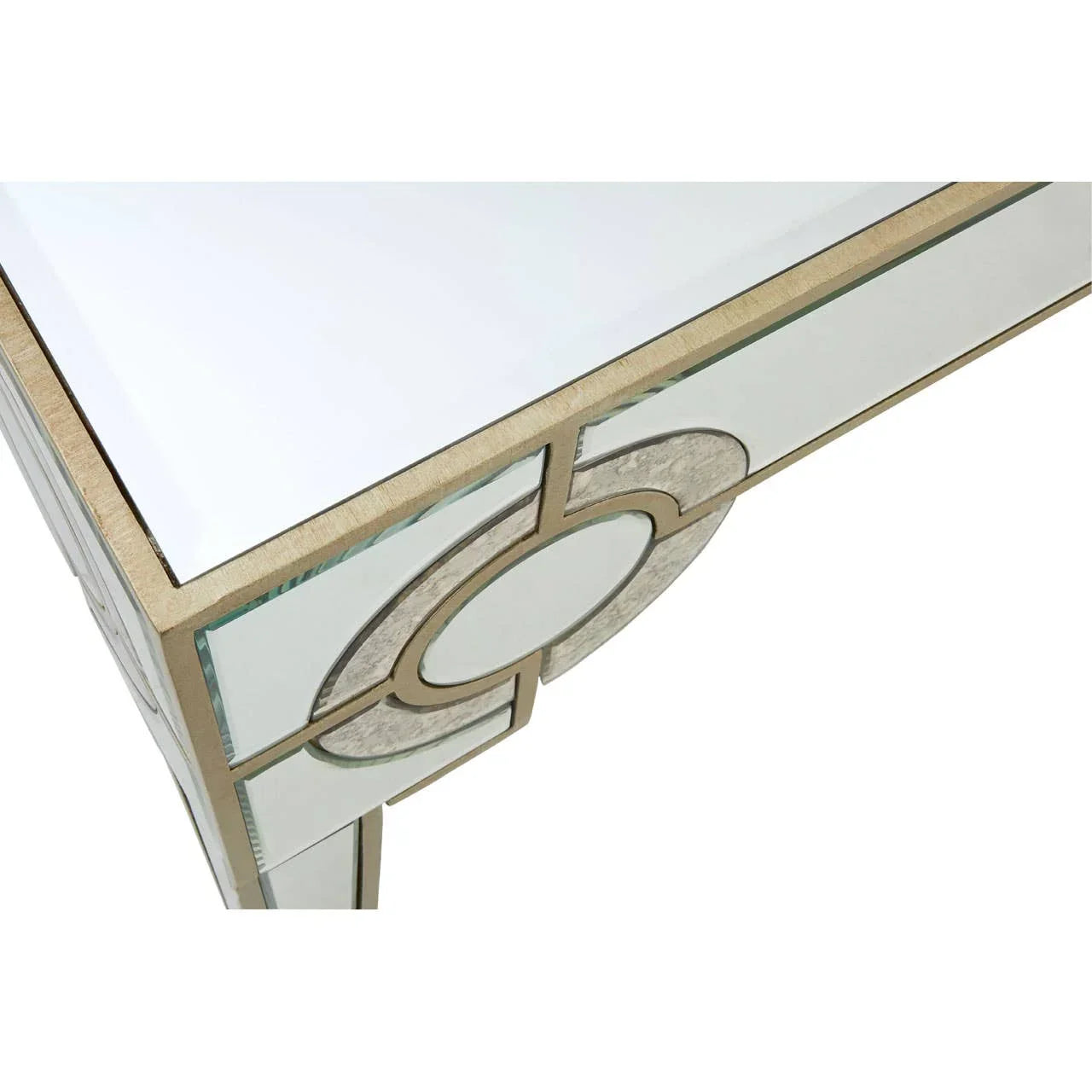 Mirrored console table corner with gold trim and geometric pattern detail