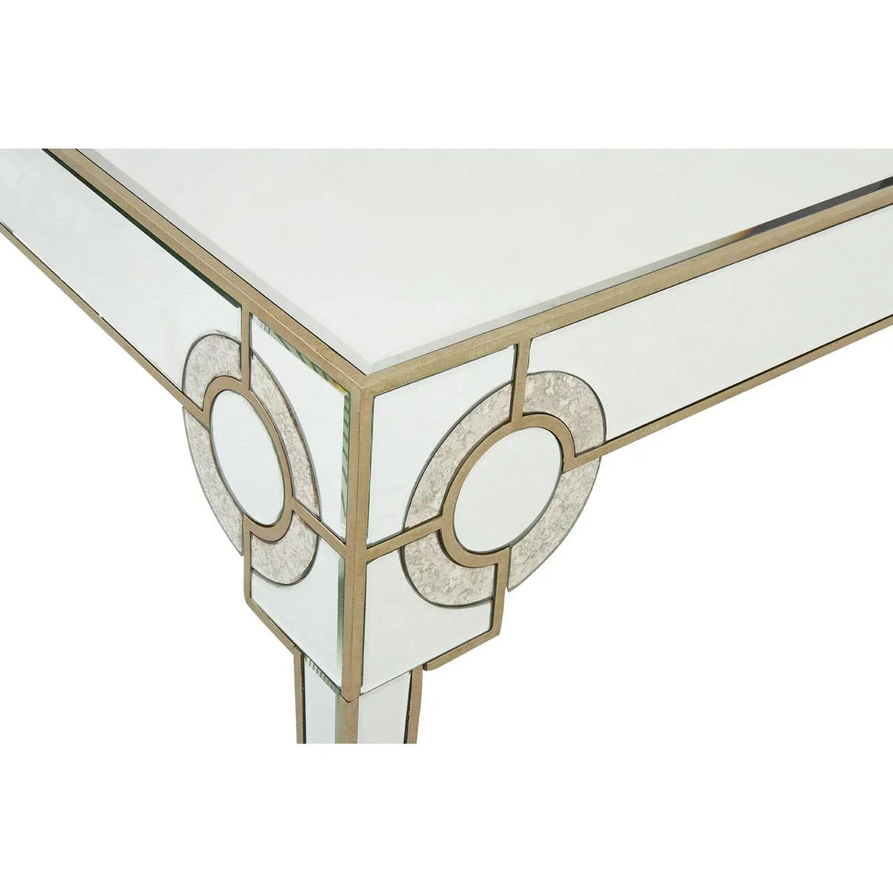Mirrored glass console table corner with gold geometric trim detail