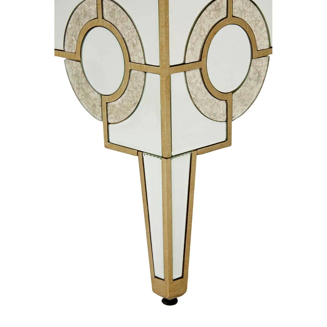Mirrored console table leg with gold geometric trim and circular pattern detail