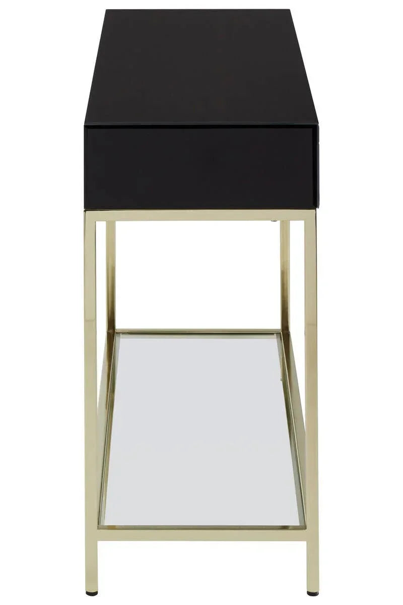 Black side table with gold metal frame and mirrored lower shelf, front angle view