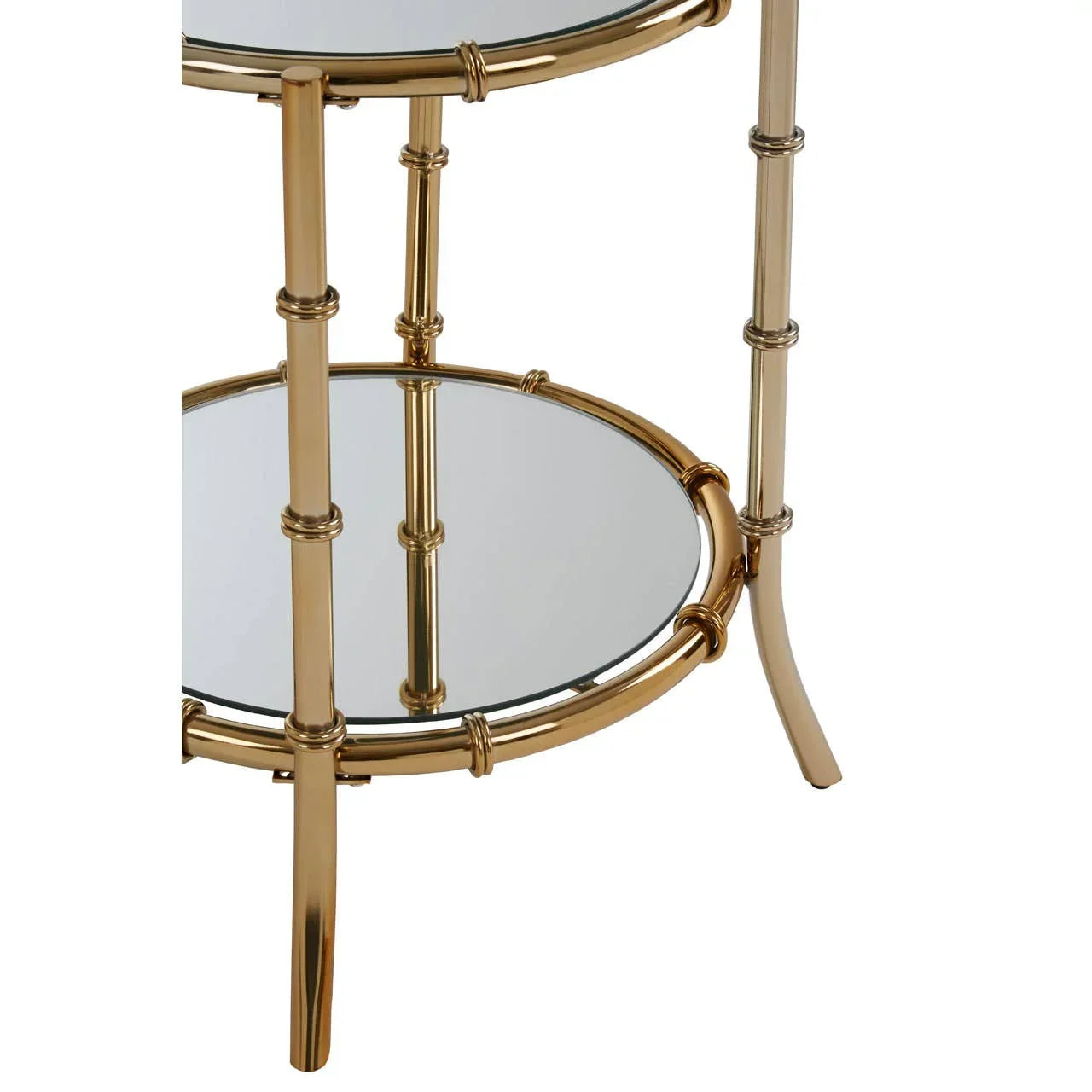 Gold metal side table with two round mirrored shelves and bamboo-style frame