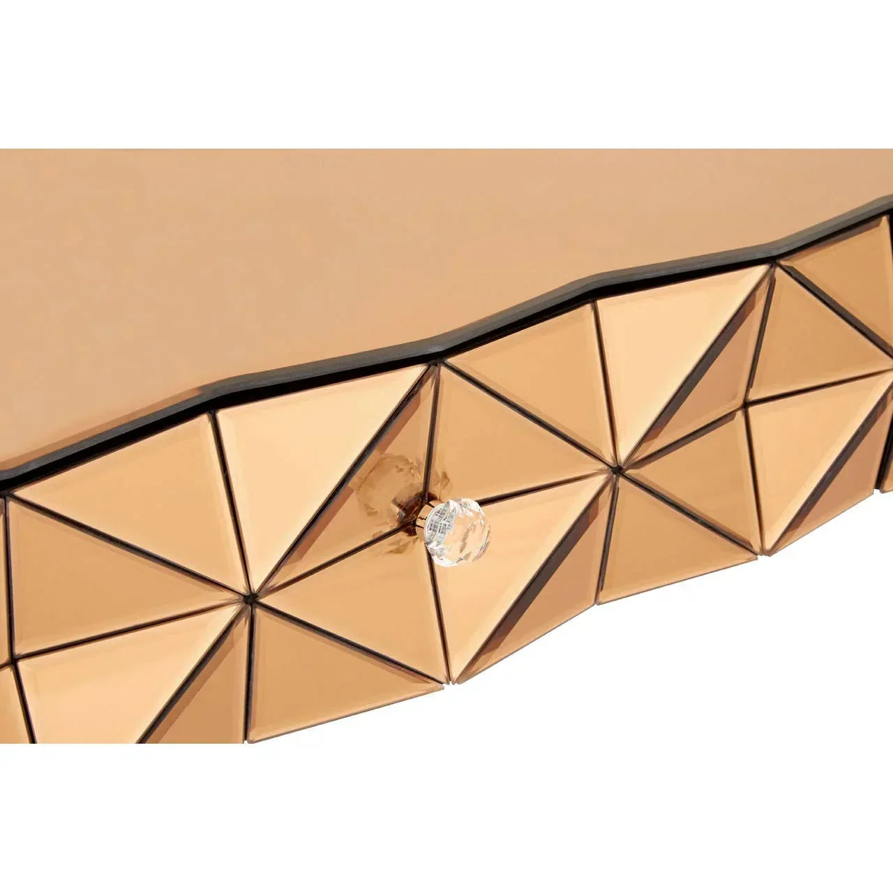 Geometric mirrored gold drawer front with crystal handle on bedroom furniture