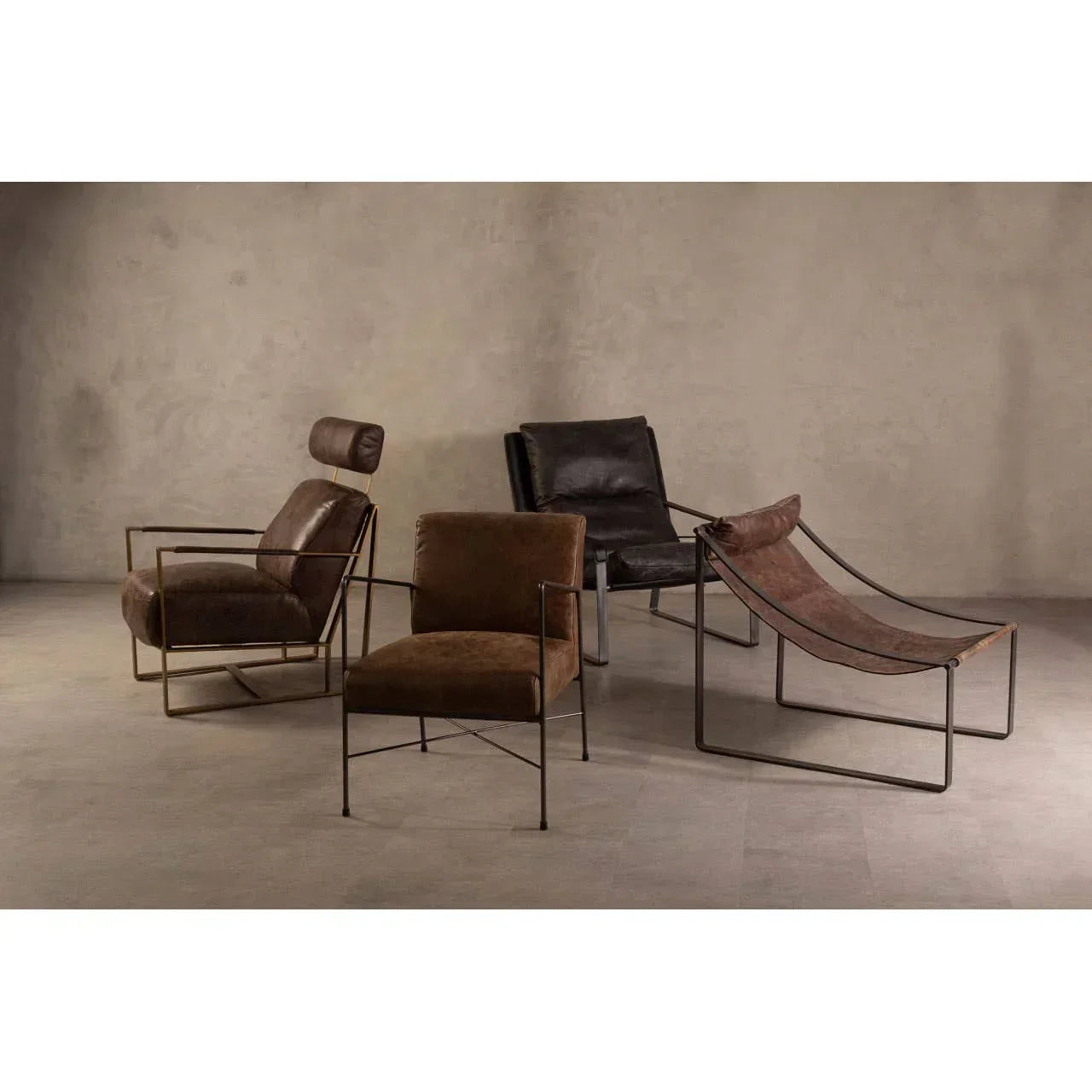 Set of modern leather accent chairs with metal frames on neutral floor