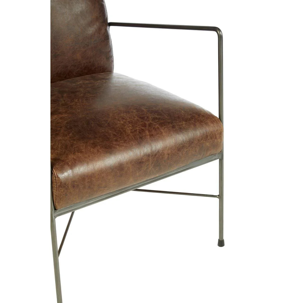 Brown leather armchair with metal frame and slim armrest, close-up side view