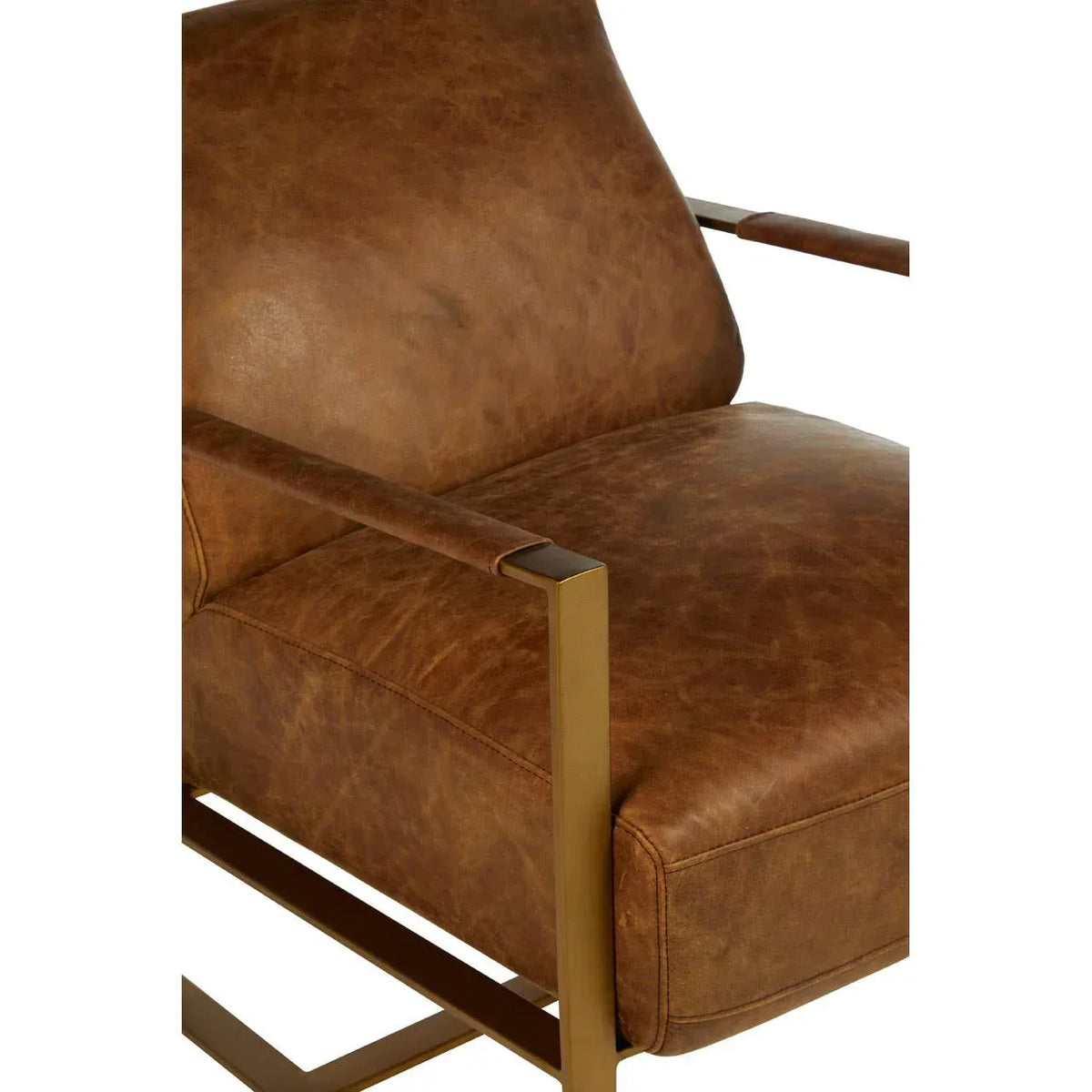 Brown leather armchair with gold metal frame and padded seat, partial side view