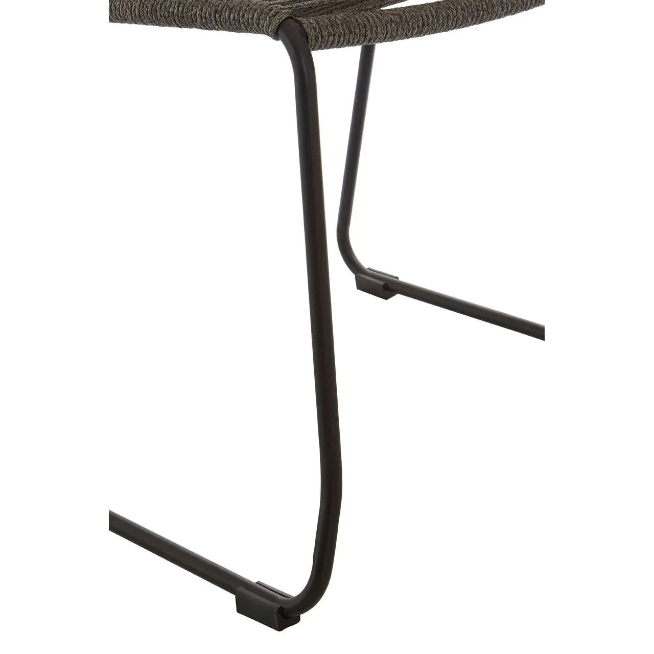 Close-up of black metal chair legs with woven rope seat detail