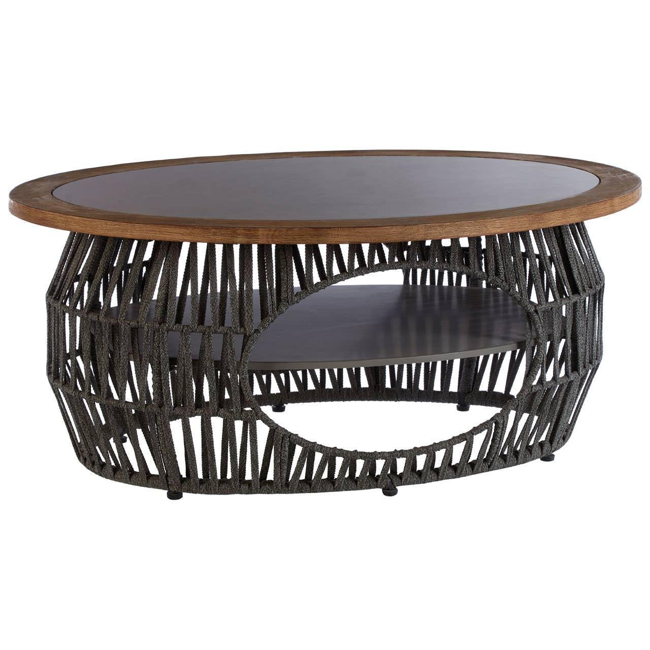 Round coffee table with wooden top and black woven rattan base, open shelf design