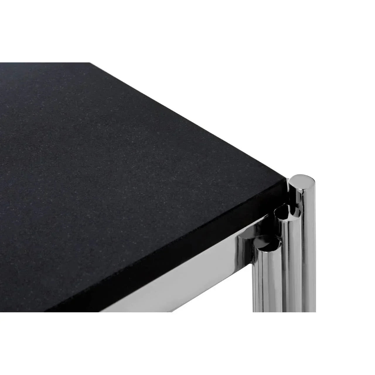 Black stone coffee table with chrome legs corner detail