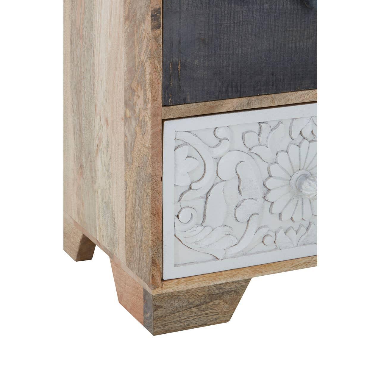 Hand-carved wood bedside cabinet corner with white floral drawer and natural grain finish