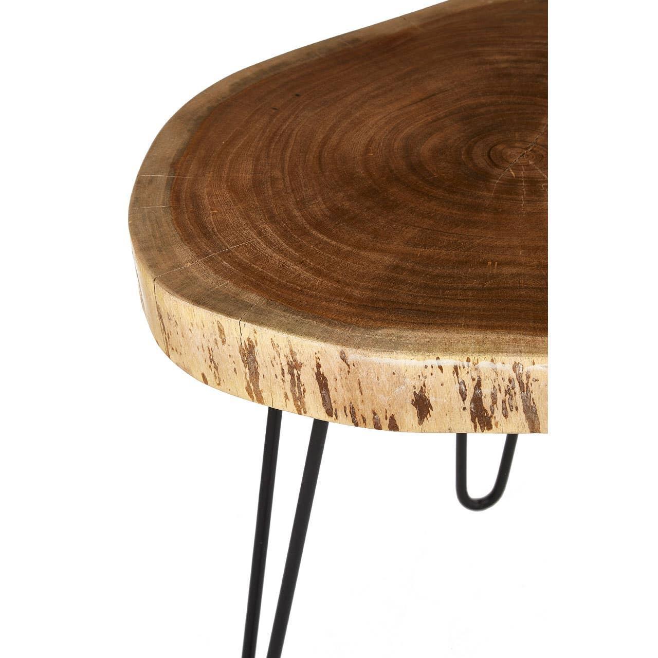 Round wooden coffee table with natural edge and black metal hairpin legs, close-up view