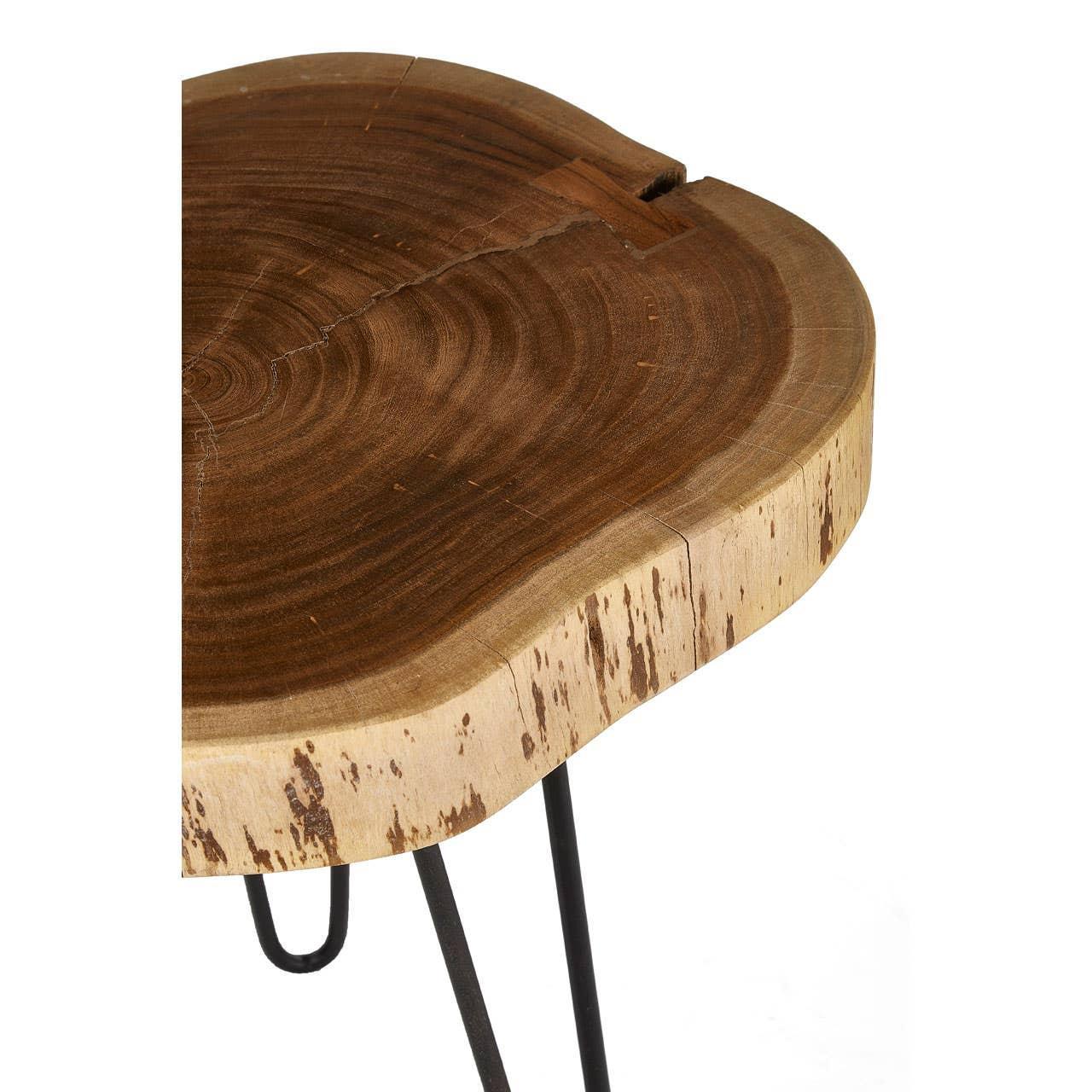 Live edge wood side table with natural tree rings and black metal legs, closeup view