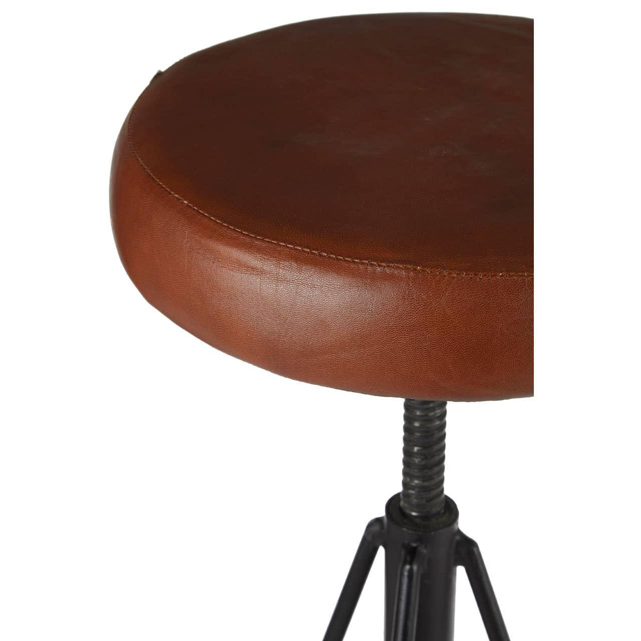Brown leather bar stool seat with metal screw base detail